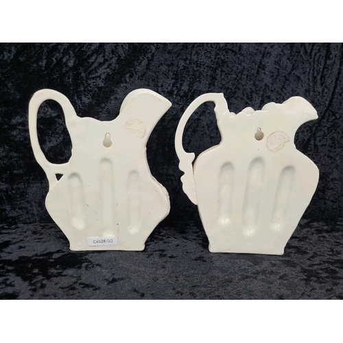 29 - Four fabulous vintage kitsch-as-they-come ceramic wall pockets. Largest approx H21cm.