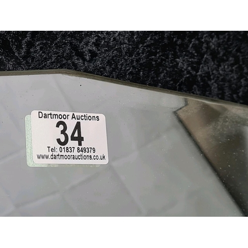 34 - Vintage frameless bevel-edged wall mirror - needs replacement chain. Approx H38 x W64cm.