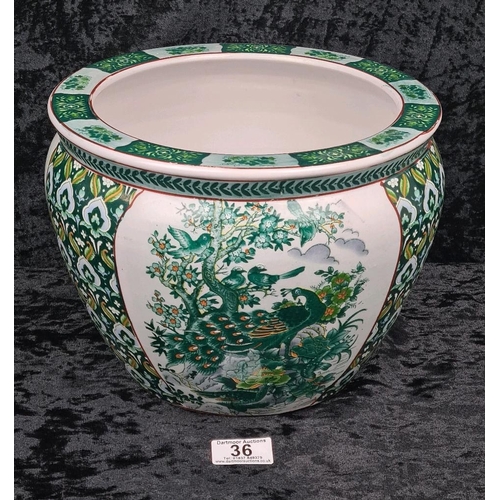 36 - Chinese pot / jardiniere with a peacock motif, and orange and green fish painted on the inside. Appr... 