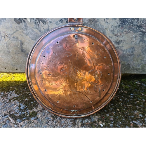 4 - Victorian copper bed warming pan with a repoussé pattern and punched holes to allow heat to escape.
