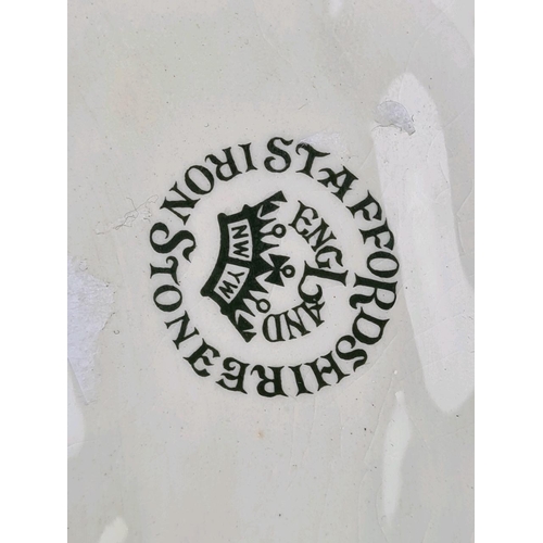 41 - Pair of kitsch Victorian-style decorative ceramic planters shaped like conch shells, with a green gl... 