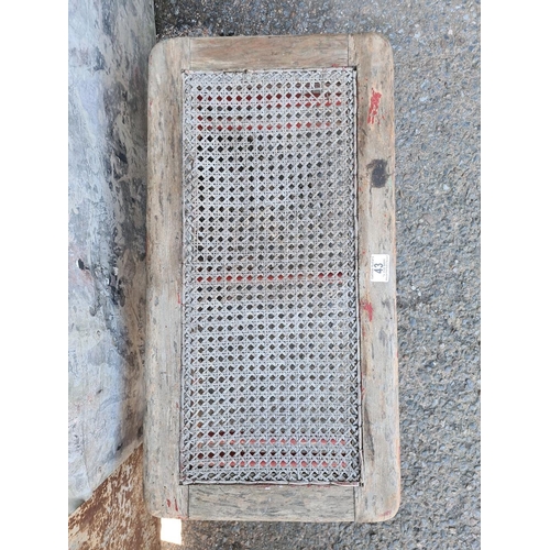 43 - Charming antique bergere cane two-seater stool/bench. Approx H26 x W69 x D37cm.