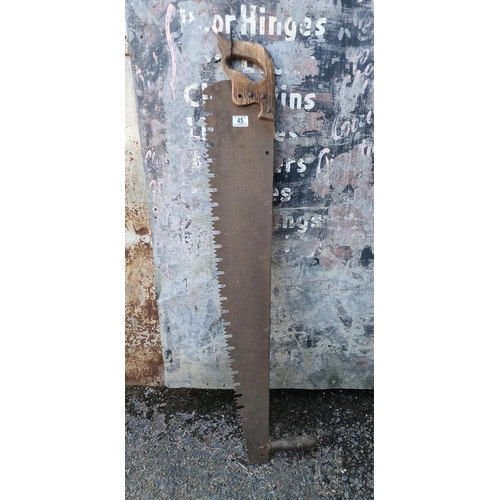 45 - Antique crosscut two-man lumberjack saw, often known as a 