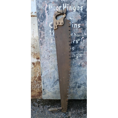 45 - Antique crosscut two-man lumberjack saw, often known as a 