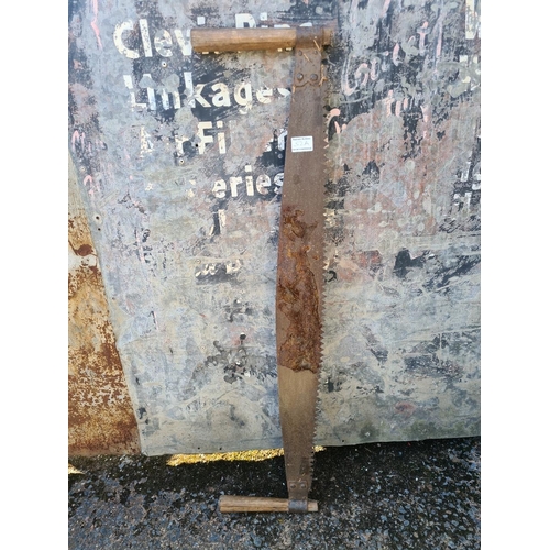 52a - Vintage two-man crosscut saw - ideal for a decorative display. Approx H108cm.