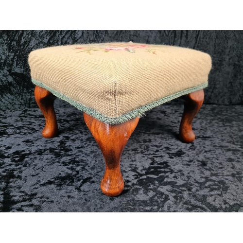 63 - Small Victorian floral design needlepoint footstool with wooden cabriole legs.