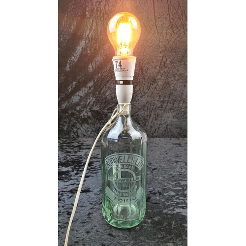 74 - Vintage soda siphon glass bottle converted to an electric lamp. Approx H40cm.
