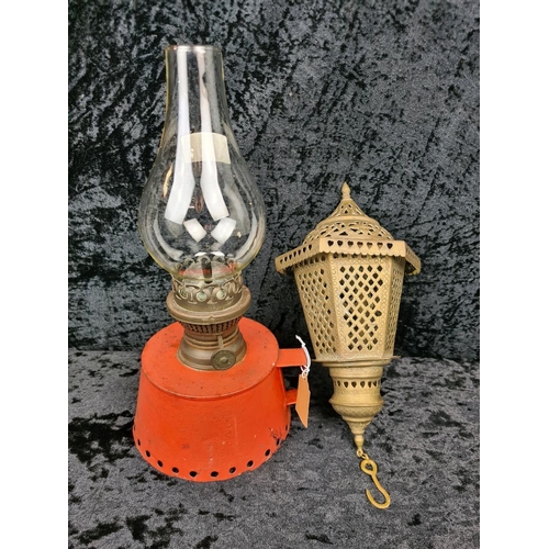 75 - Red metal vintage oil lamp along with a Moroccan brass hanging lantern with wall mount. Tallest appr... 