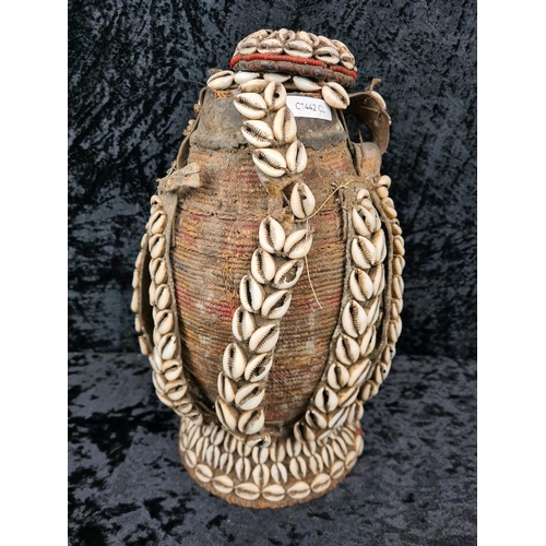 77 - Traditional Ethiopian milk/water container - a cowrie shell adorned woven vessel, often referred to ... 