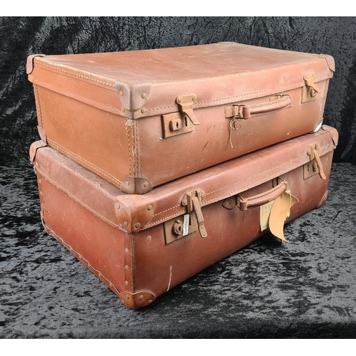 83 - Good pair of vintage brown leather suitcases, both handles intact. Largest approx W65 x D39cm.