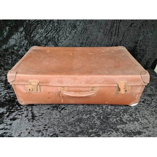83 - Good pair of vintage brown leather suitcases, both handles intact. Largest approx W65 x D39cm.