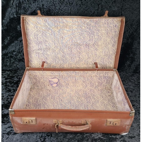 83 - Good pair of vintage brown leather suitcases, both handles intact. Largest approx W65 x D39cm.