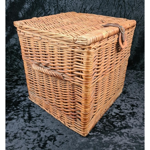 85 - Square wicker storage basket with handles and leather fastening. Approx H39 x W37 x D37cm.