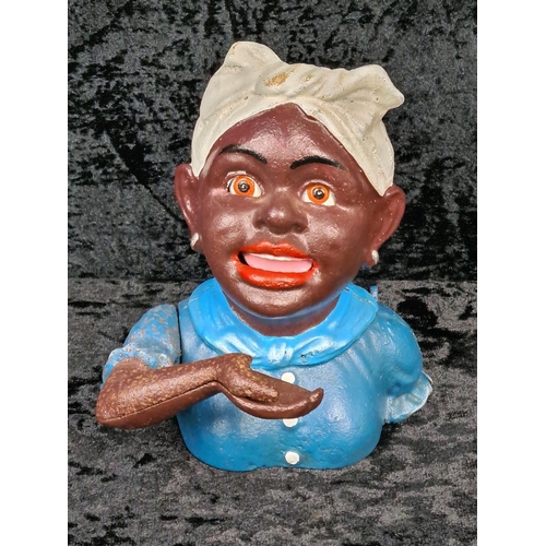 99 - Vintage reproduction cast iron 'Jolly Woman' mechanical money box.