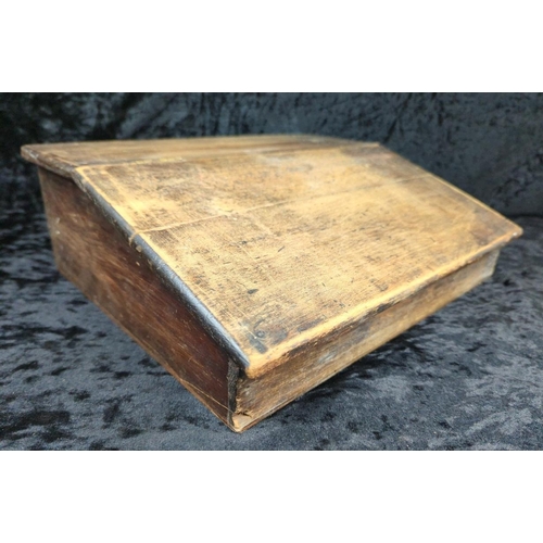 100 - Antique wooden writing slope filled with vintage writing implements and mathematical instruments.