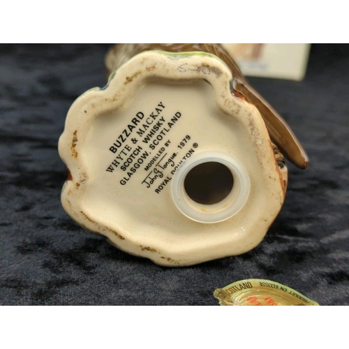 117 - Two boxed Whyte & Mackay Royal Doulton ceramic decanters from the 