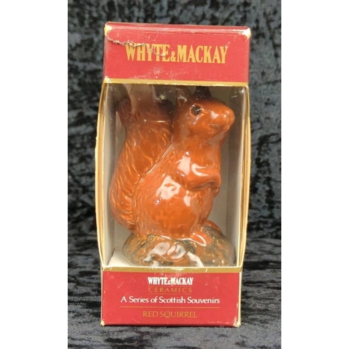 119 - Four boxed Royal Doulton Whyte & Mackay ceramic decanters from the The Series of Scottish Owls - Sno... 
