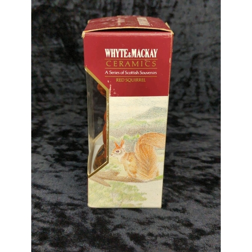 119 - Four boxed Royal Doulton Whyte & Mackay ceramic decanters from the The Series of Scottish Owls - Sno... 