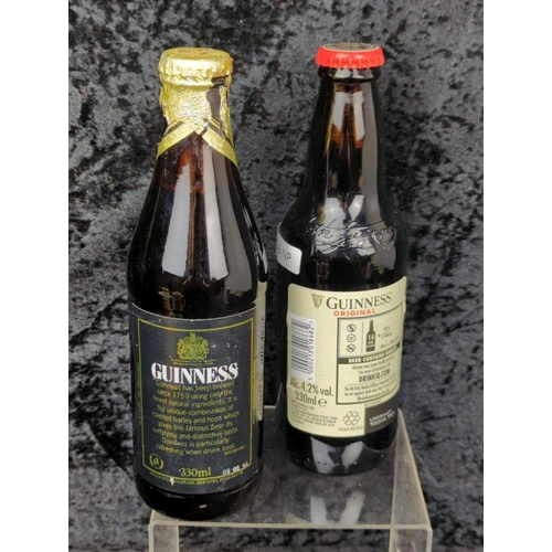 121 - Guinness goodies galore - two commemorative bottles, and four jugs with different designs.