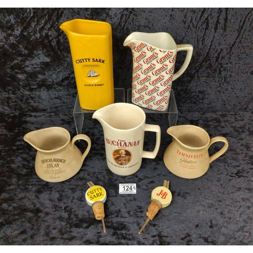 124 - Five vintage whisky jugs - Cutty Sark, Grants, The Buchanan, Tamnavulin, Bruichladdich, and two cera... 