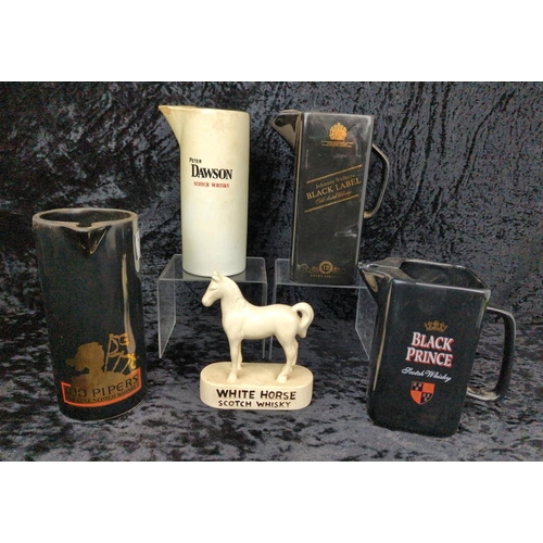 125 - Four vintage whisky jugs - Johnnie Walker Black Label, Peter Dawson, Black Prince, 100 Pipers, and a... 