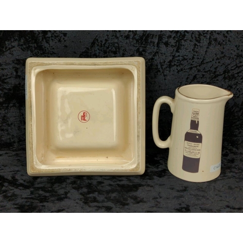 128 - Vintage Black & White whisky jug, and a Teacher's ashtray.