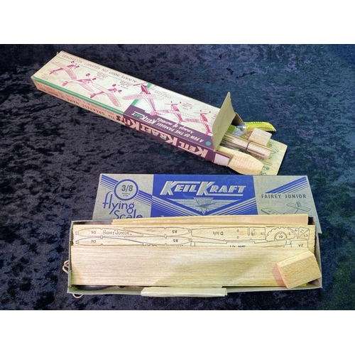 130 - Four boxed balsa wood Keilkraft model aircraft, unmade.