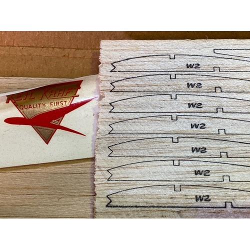 130 - Four boxed balsa wood Keilkraft model aircraft, unmade.
