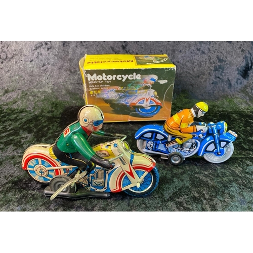 133 - Two vintage tinplate motorcycles, one boxed, made in China.