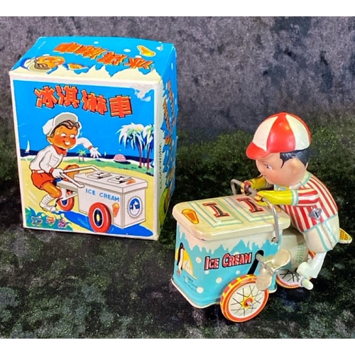 135 - Three vintage tinplate toys, 'fire chief', 'ice cream truck' made in China, and 'ringing tricycle' m... 