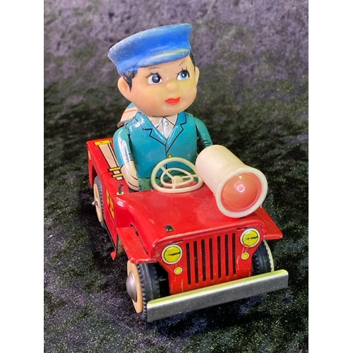 135 - Three vintage tinplate toys, 'fire chief', 'ice cream truck' made in China, and 'ringing tricycle' m... 
