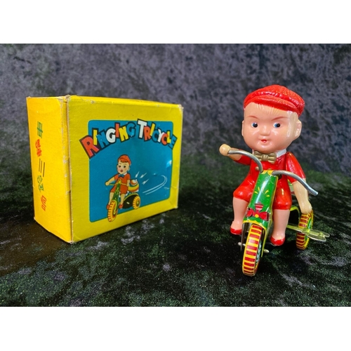 135 - Three vintage tinplate toys, 'fire chief', 'ice cream truck' made in China, and 'ringing tricycle' m... 