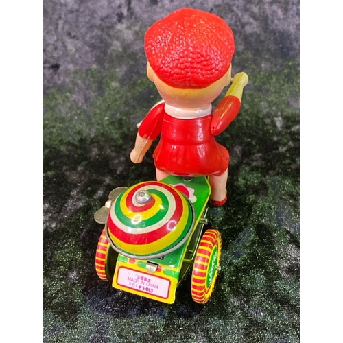 135 - Three vintage tinplate toys, 'fire chief', 'ice cream truck' made in China, and 'ringing tricycle' m... 
