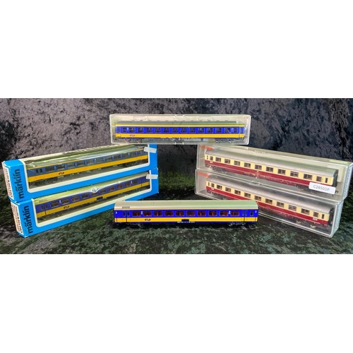 140 - Three boxed Fleischmann 00 Gauge carriages, two boxed Marklin carriages, and one unboxed Marklin car... 
