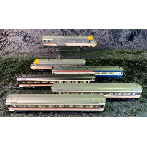 142 - Hornby 00 gauge Intercity train set, two engines and four carriages, unboxed.