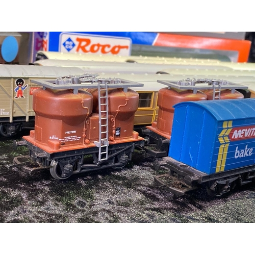 143 - Roco, Hornby and Dapol 00 gauge model carriages and goods wagons - five boxed and twelve unboxed - w... 