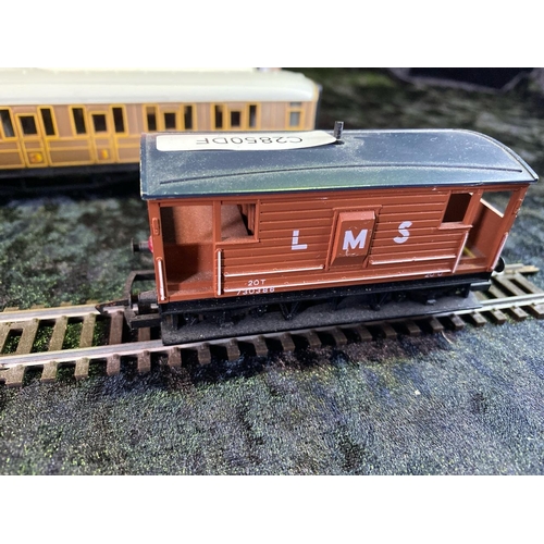 143 - Roco, Hornby and Dapol 00 gauge model carriages and goods wagons - five boxed and twelve unboxed - w... 