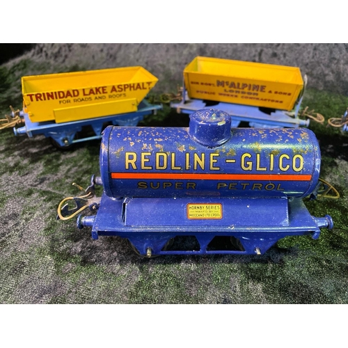 145 - Hornby 0 gauge Meccano goods trucks, including a Redline-Glico super petrol tanker