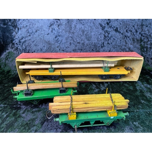 146 - Hornby 0 gauge Meccano timber transporting goods wagons and three 1950s Meccano magazines, five smal... 