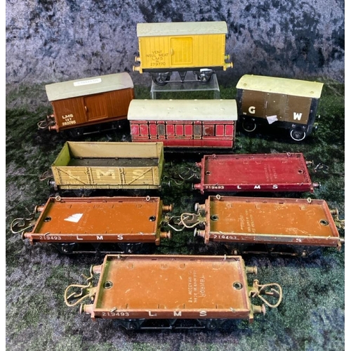 147 - Hornby 0 gauge Meccano GW and LMS goods wagons and one carriage - nine in total.