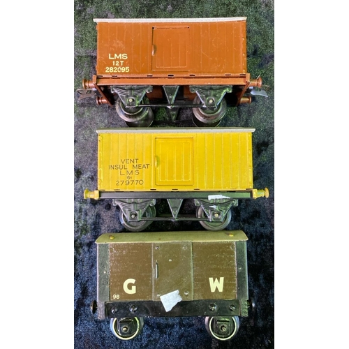 147 - Hornby 0 gauge Meccano GW and LMS goods wagons and one carriage - nine in total.
