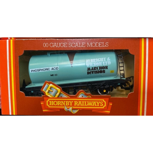 150 - Eight Hornby 00 gauge boxed goods wagons, one goods carriage and a '61520' B Class locomotive, boxed... 