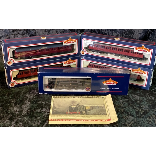 153 - Boxed Bachmann 00 gauge branch line models, standard class 80061 locomotive and four carriages.