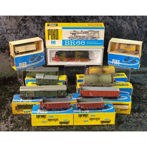 162 - Piko H0 gauge boxed engine BR66 and ten various boxed goods wagons.