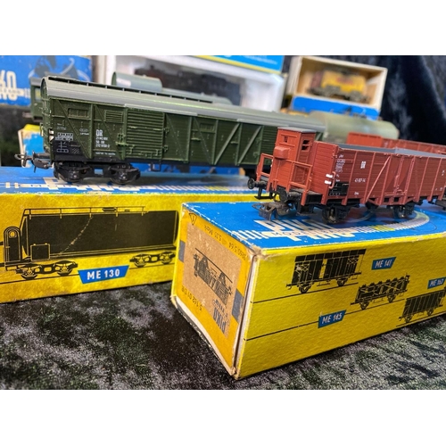 162 - Piko H0 gauge boxed engine BR66 and ten various boxed goods wagons.
