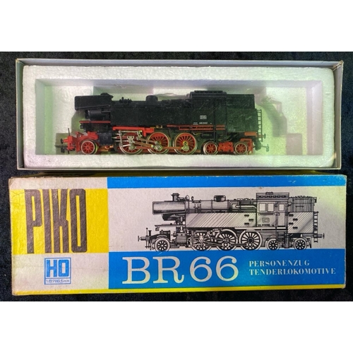 162 - Piko H0 gauge boxed engine BR66 and ten various boxed goods wagons.