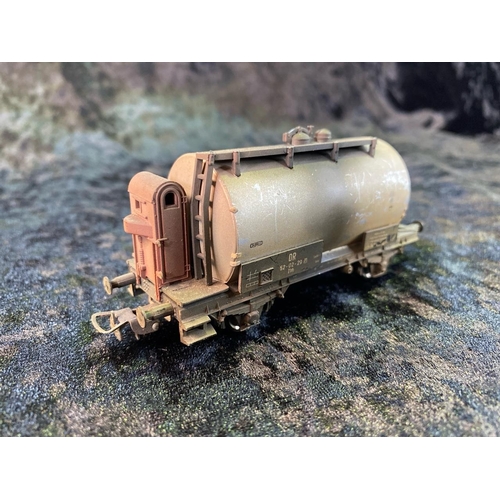 168 - H0 Gauge models. Two Lima diesel engines (red), two Lima carriages, two Liliput boxed goods wagons a... 