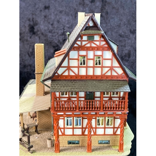 173 - H0 gauge plastic train layout models, German style, greenhouses, watermill and other industrial. Tot... 