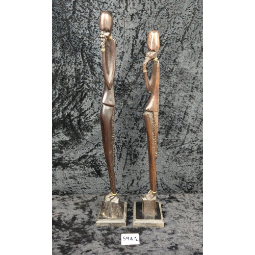59a - Two hand-carved hardwood East African tribal sculptures. Tallest approx H45cm.