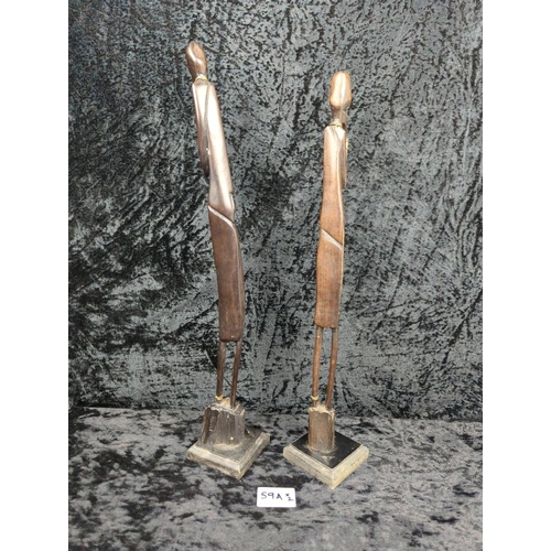 59a - Two hand-carved hardwood East African tribal sculptures. Tallest approx H45cm.